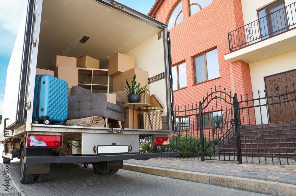 A van full with house goods and ready to go. Showing house removal services.